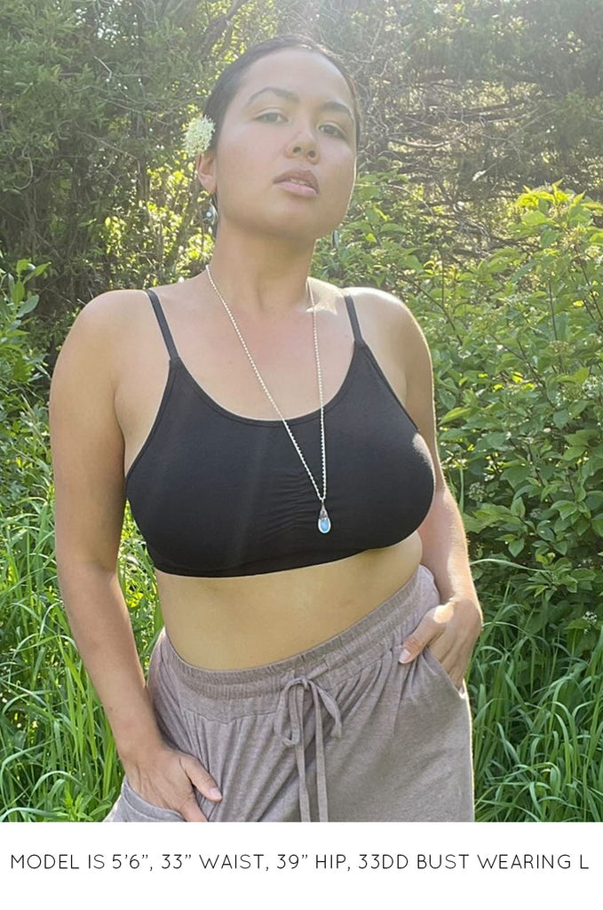 Model wearing black Miakoda Bralette. 