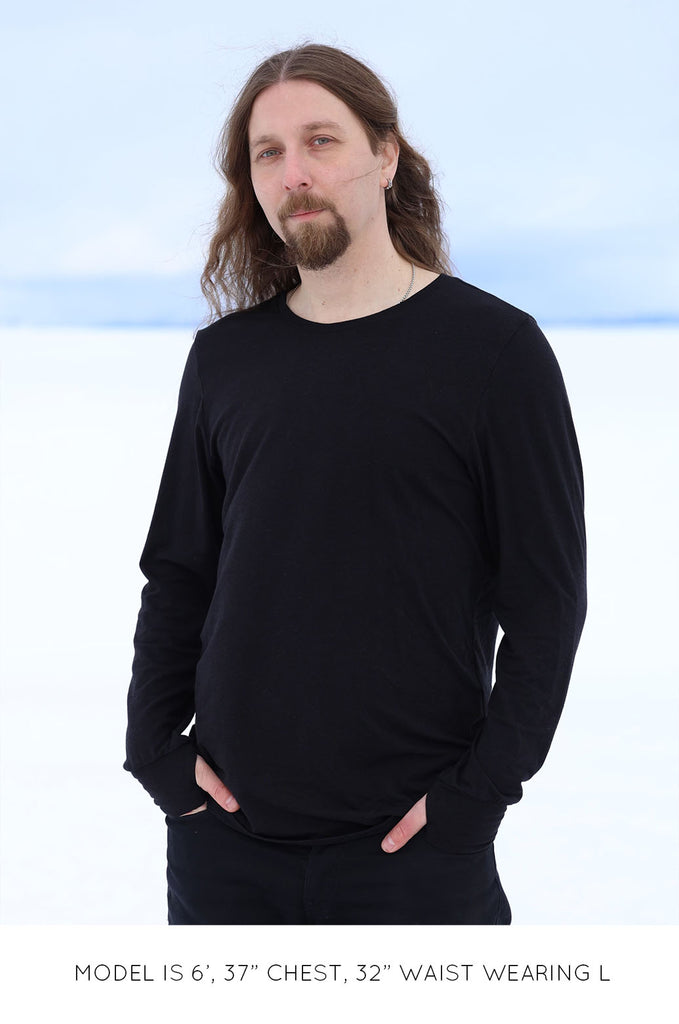 Model wearing black oversized long sleeve tshirt by Miakoda. 