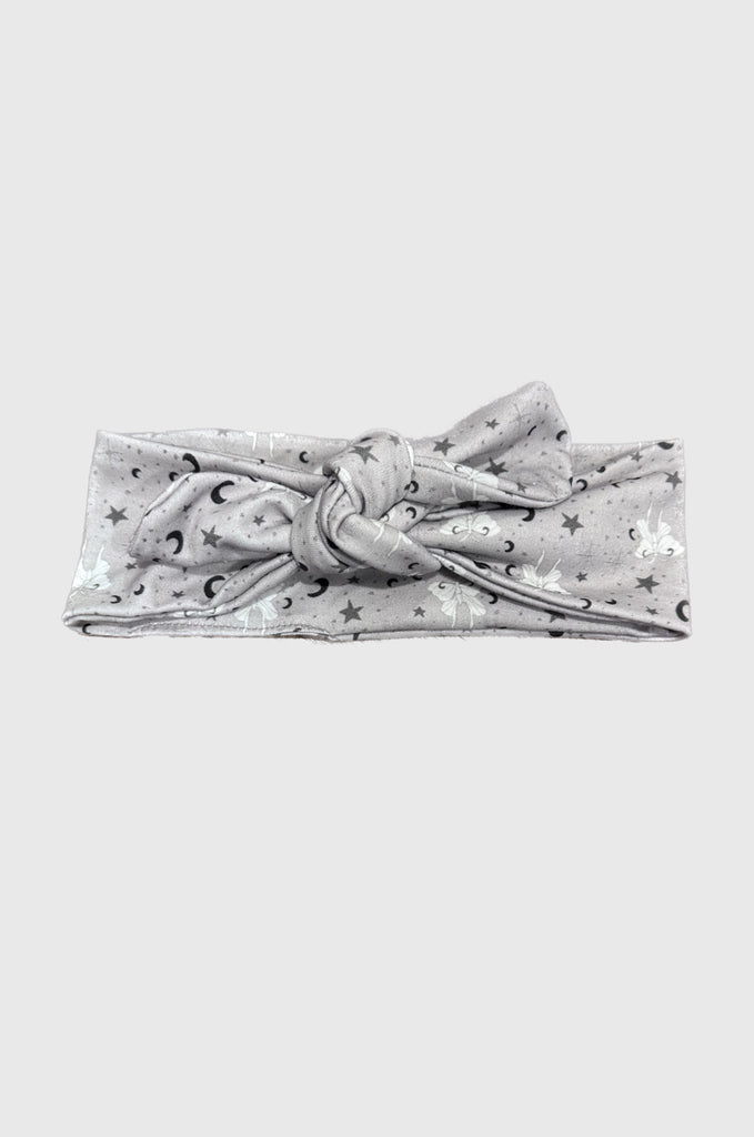Grey print headband by Miakoda. 